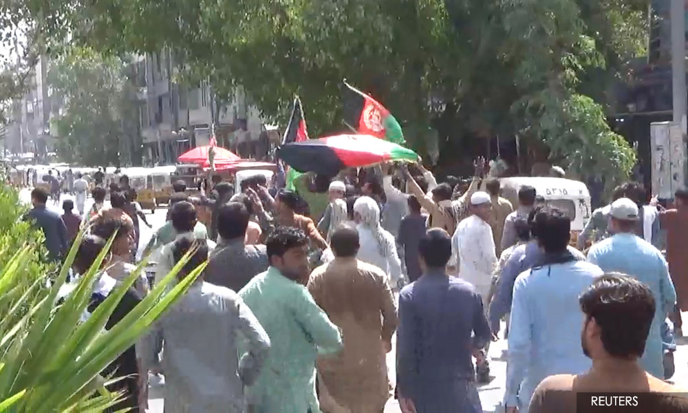 Several killed amid firing by Taliban and stampede during rally - witness