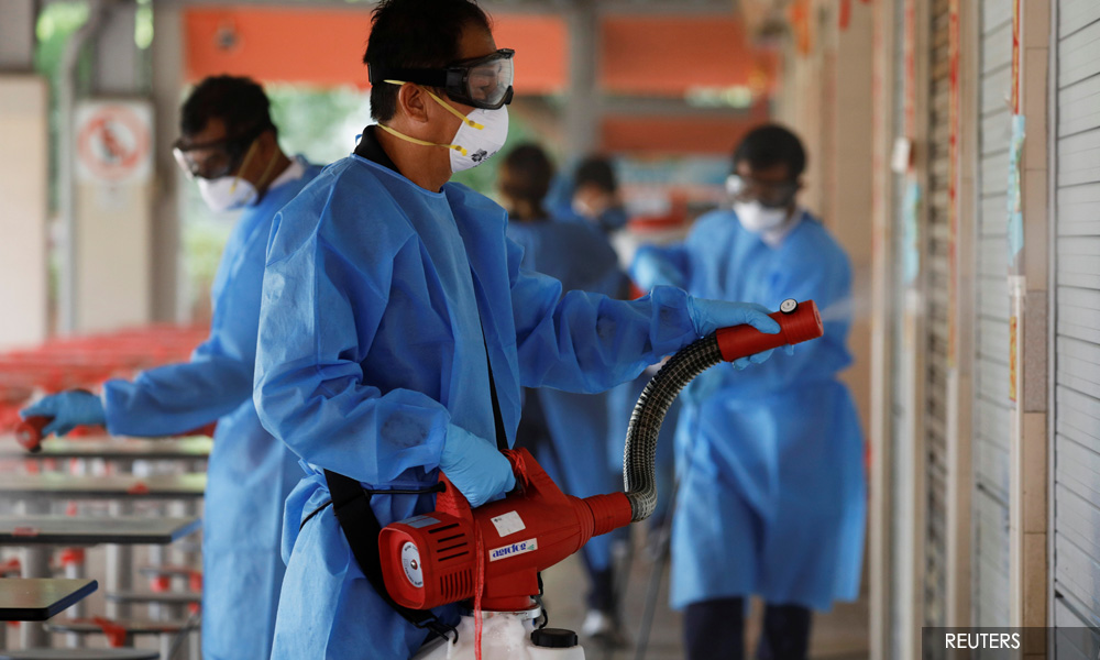 Singapore prepares for long term life - and death - with Covid-19