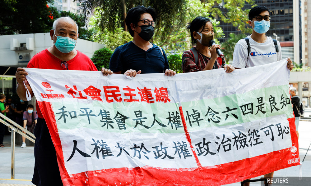 Nine HK activists get 6-10 months in prison for unauthorised Tiananmen vigil