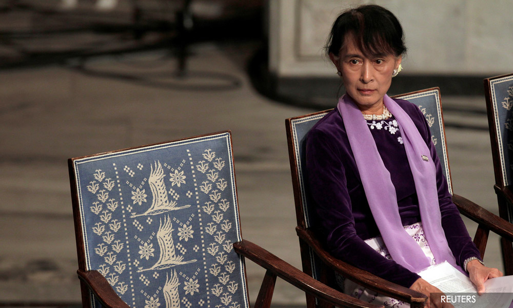 Suu Kyi returns to court but still 'somewhat dizzy'