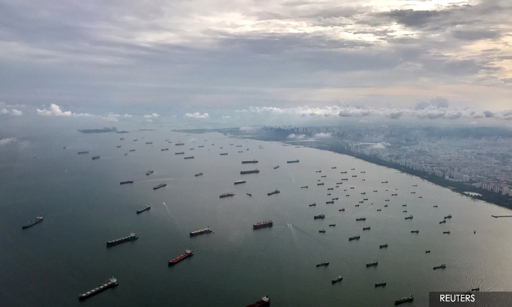 Shipowners make payoffs to free vessels held by Indonesian navy near S'pore- sources