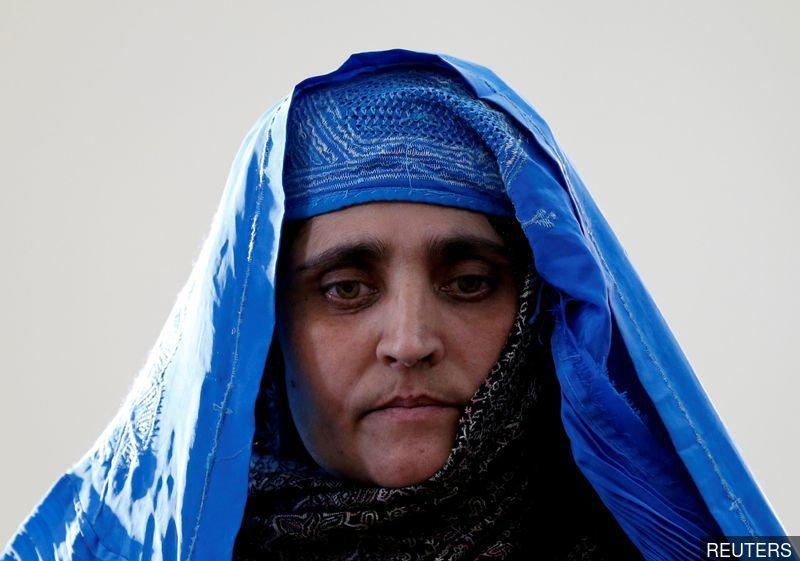 Italy takes in National Geographic's green-eyed 'Afghan Girl'