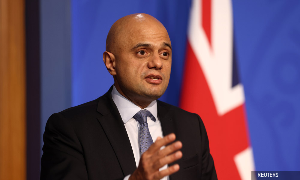 England has community transmission of Omicron variant, health minister says
