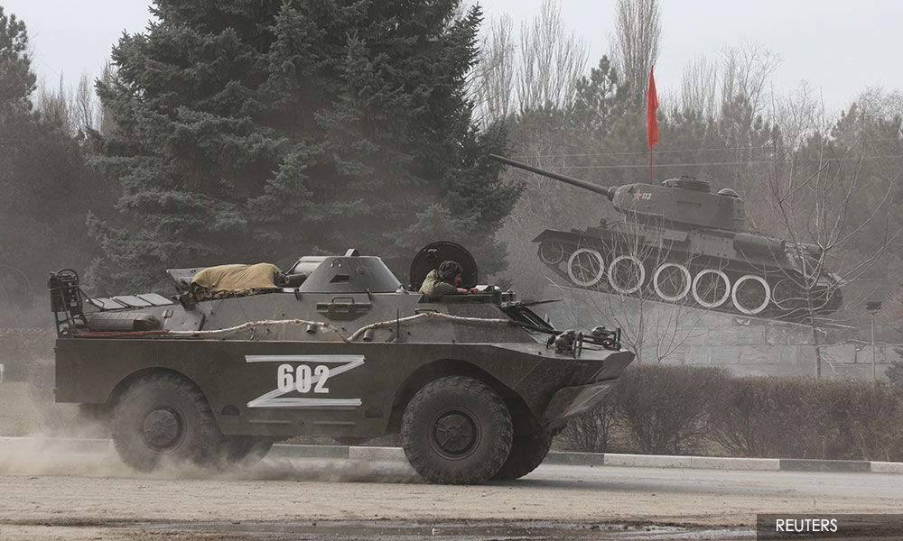 Ukraine battles Russian invasion, thousands flee fighting