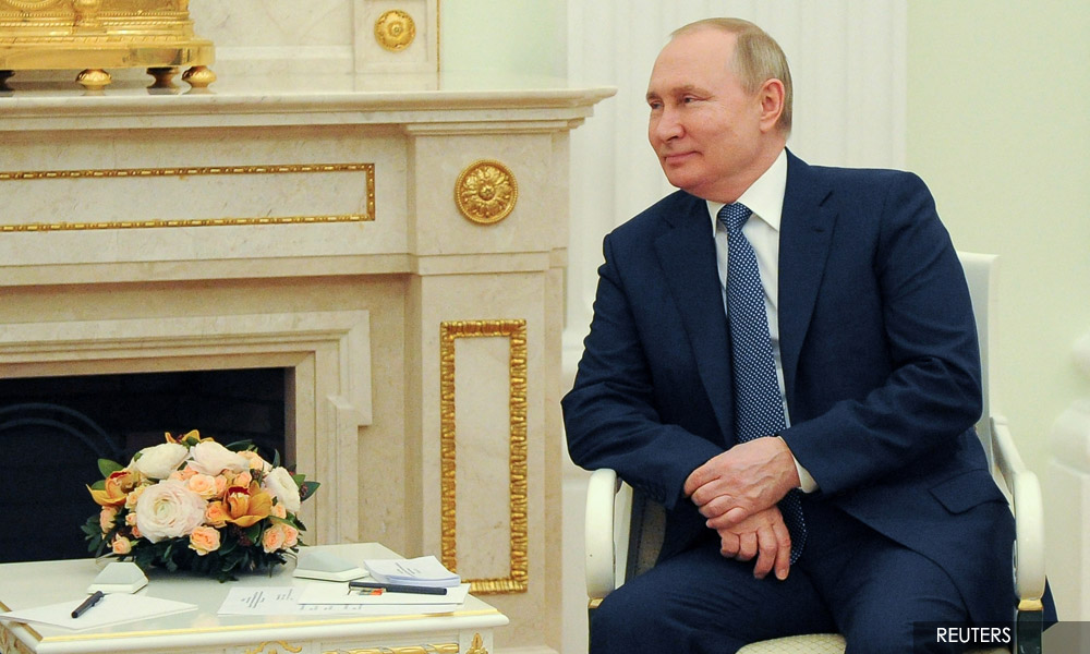 Putin oversees nuclear drills, US says Russian forces 'poised to strike' Ukraine