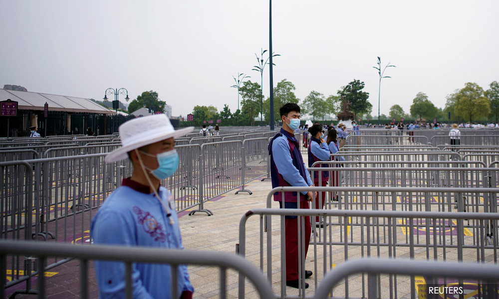 Shanghai's Disney resort shut amid record daily local Covid-19 infections
