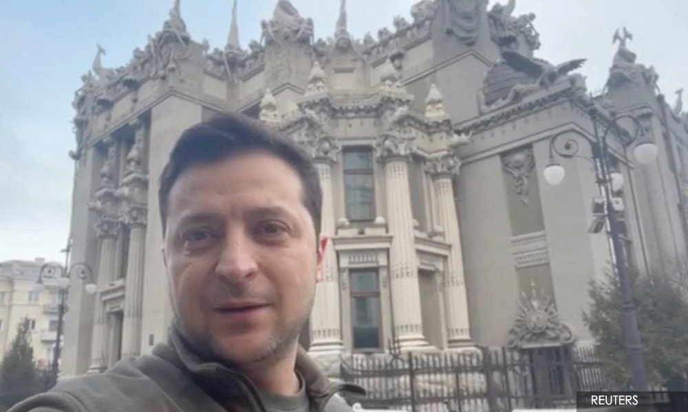 Smartphone in hand, Ukraine's president takes centre stage in a capital under attack