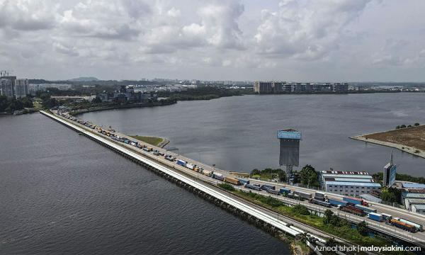 No plans to fully allow cross-border e-hailing, Singapore says