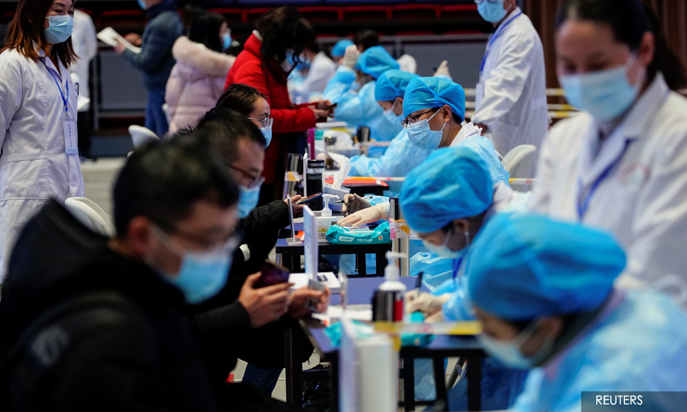China's soaring Covid-19 case load raises concerns about containment costs