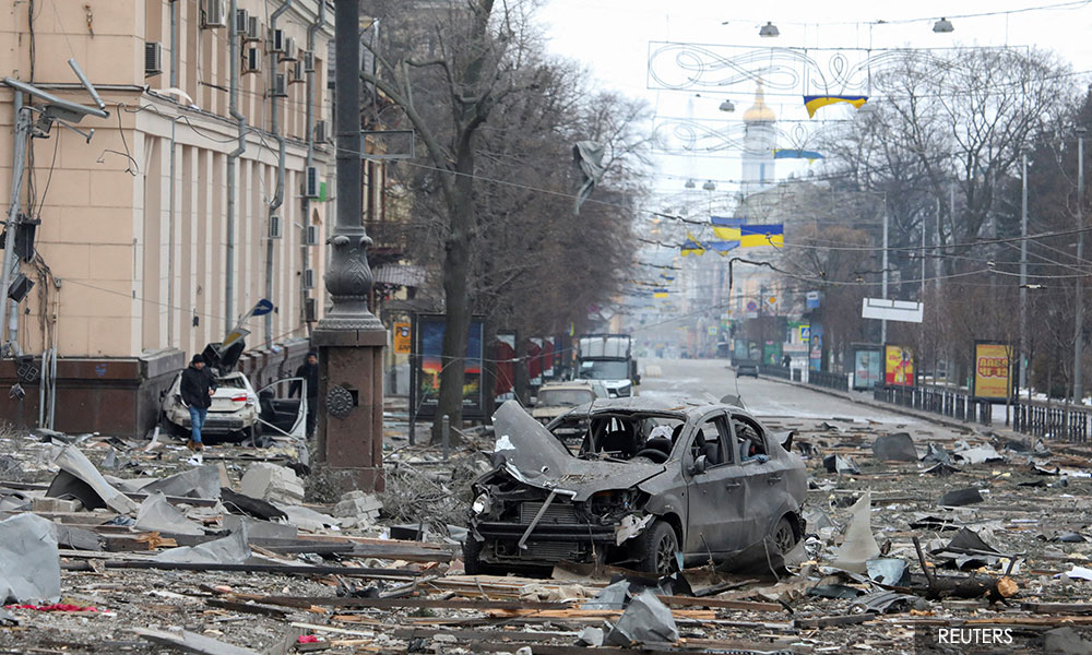 Russia bombards Ukraine urban areas as armed convoy stalls
