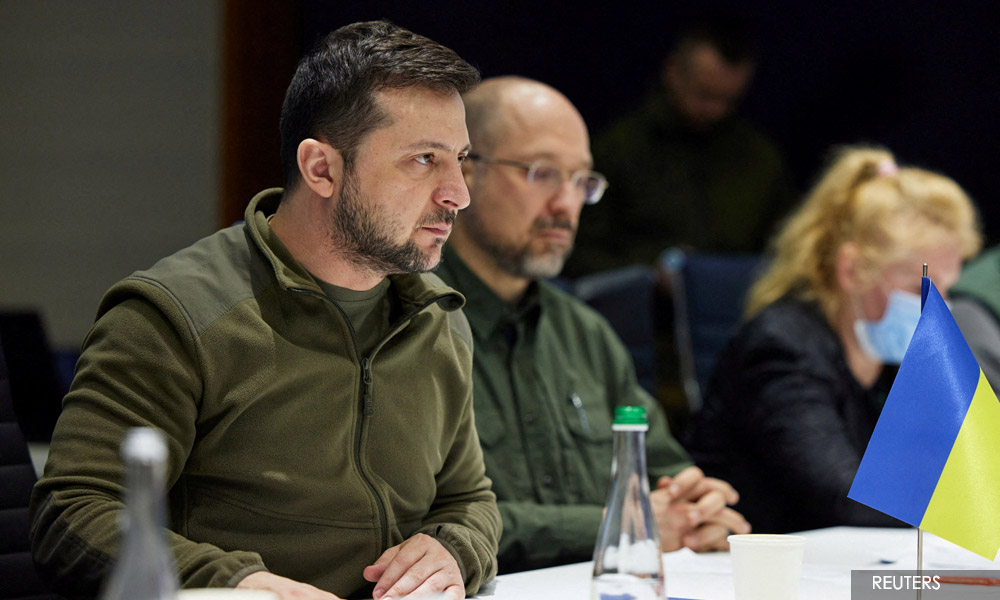 Ukraine president says peace talks now more 'realistic' as Biden visits Nato