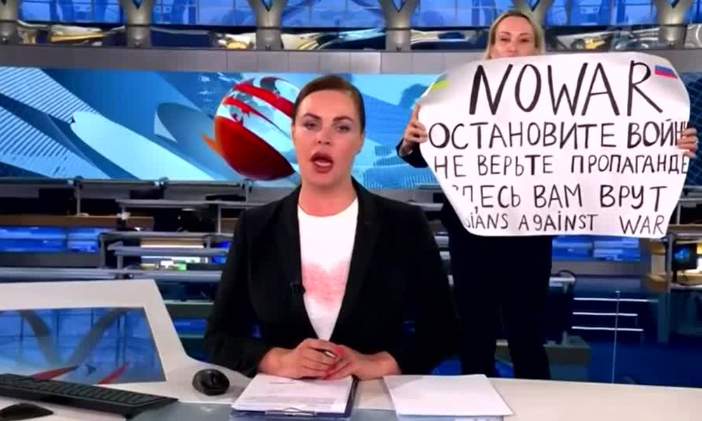 US warns China not to help Russia as anti-war protest disrupts state TV