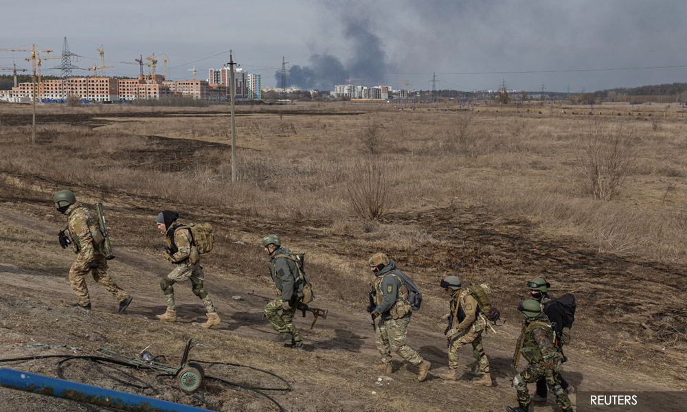 Russia advances in eastern Ukraine, strikes base near Polish border - reports
