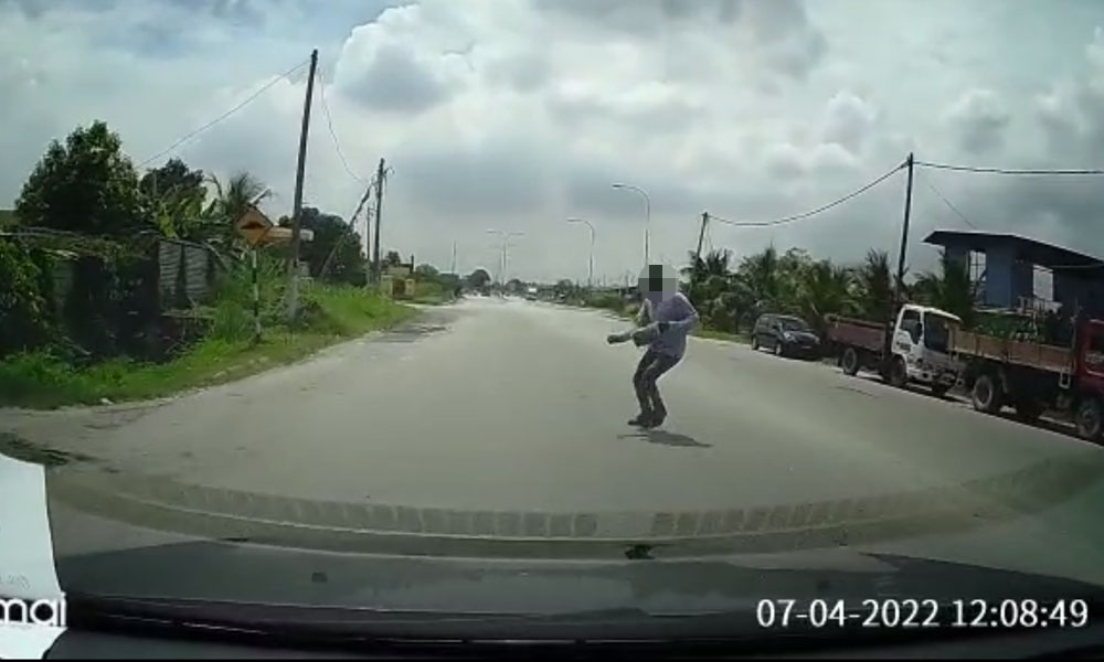 Police arrest suspect for throwing himself into oncoming traffic