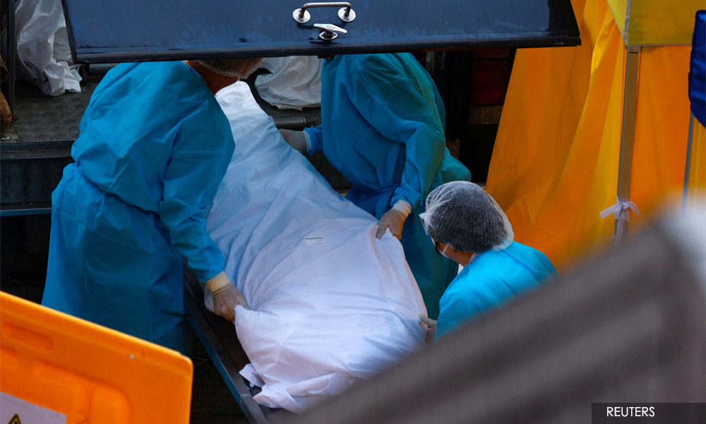 'So many bodies piled up': Hong Kong funeral services overwhelmed by Covid