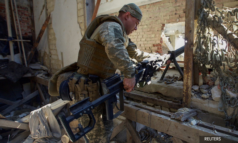 Russia pummels eastern towns in bid to encircle Ukraine forces