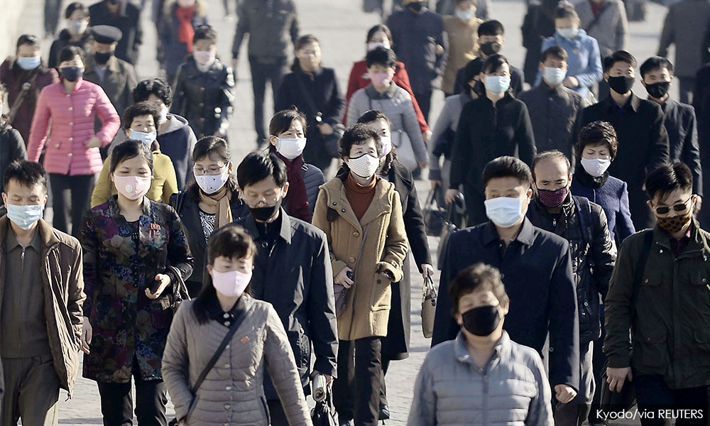 N Korea reports first Covid death as fever spreads 'explosively'