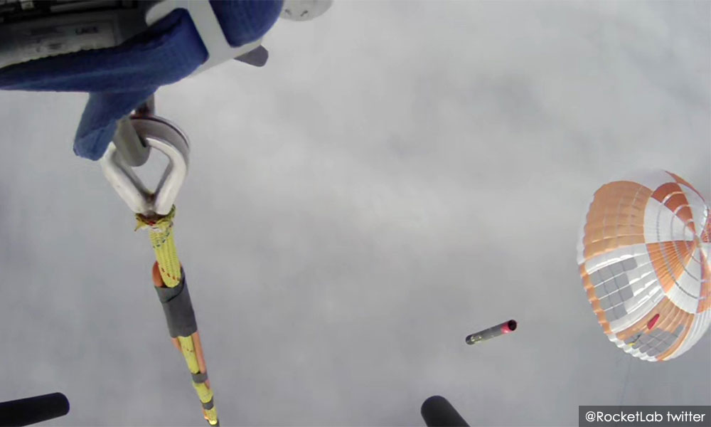 Rocket Lab catches, drops rocket booster with helicopter in key reusability test