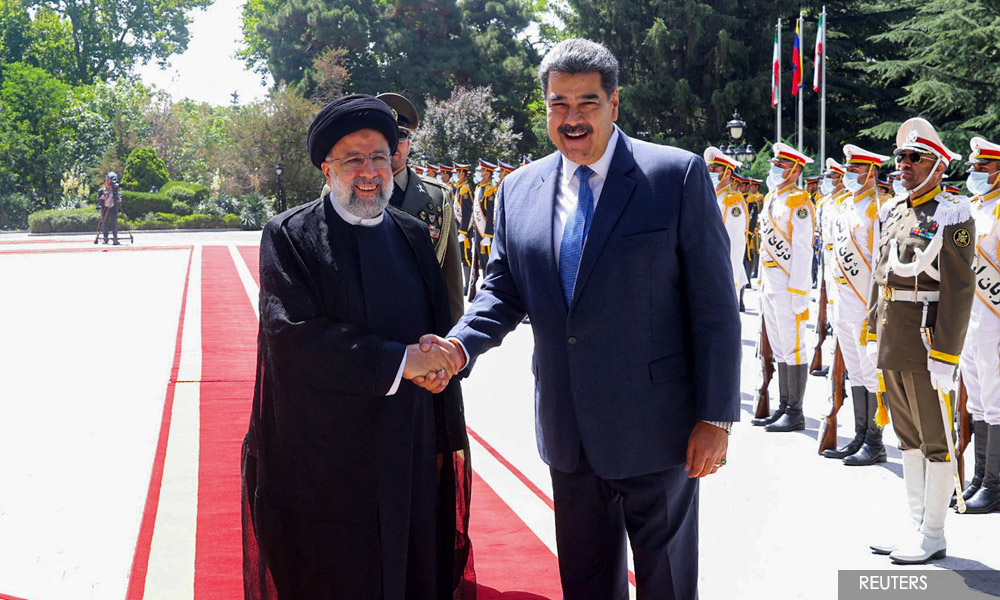 Under US sanctions, Iran and Venezuela sign 20-year pact