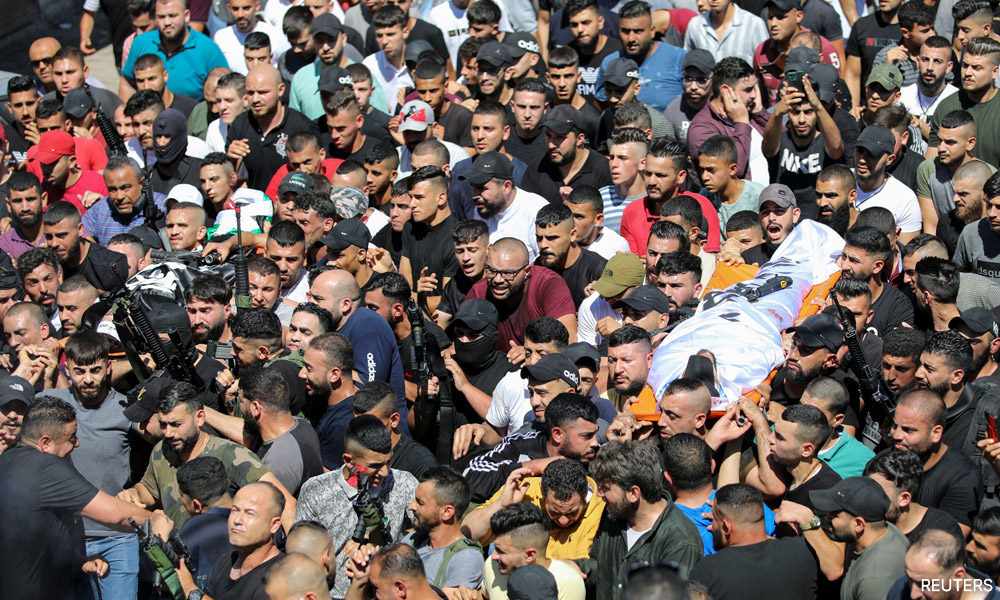 Israeli forces kill 2 gunmen in W Bank clash, strike boat off Gaza