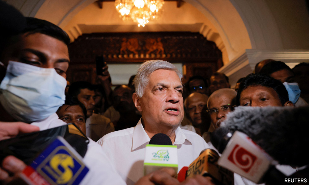 Sri Lankan security forces raid protest camp as new leaders sworn in