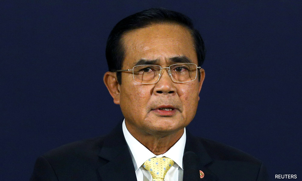 Suspended Thai PM Prayuth says to continue as defence minister