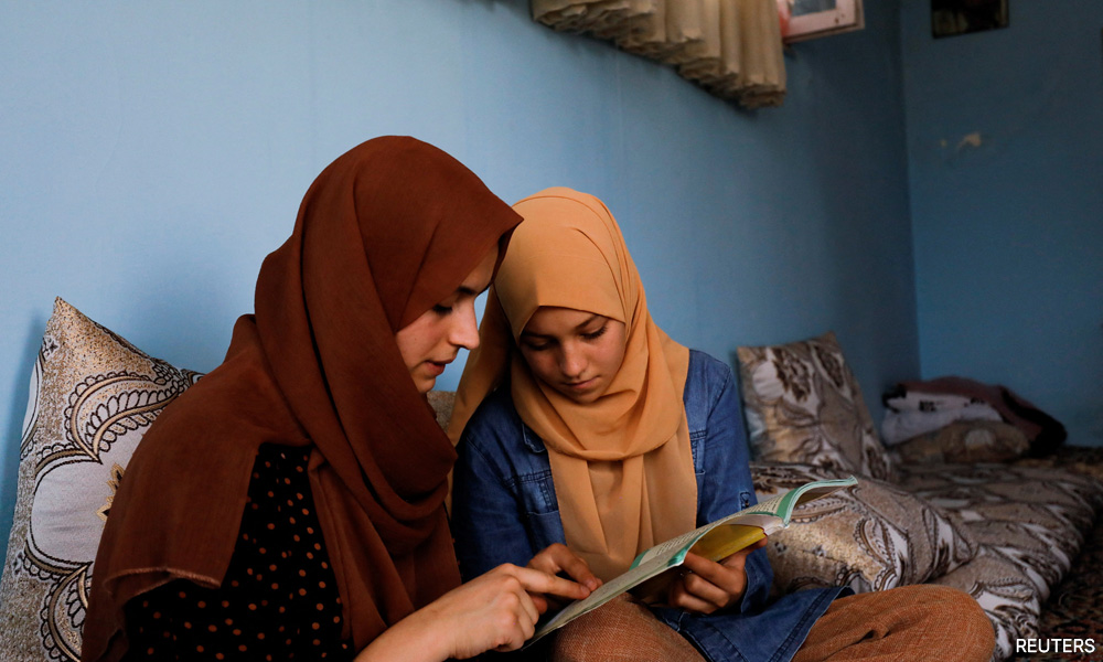 A year after Taliban's return, some women fight for lost freedoms