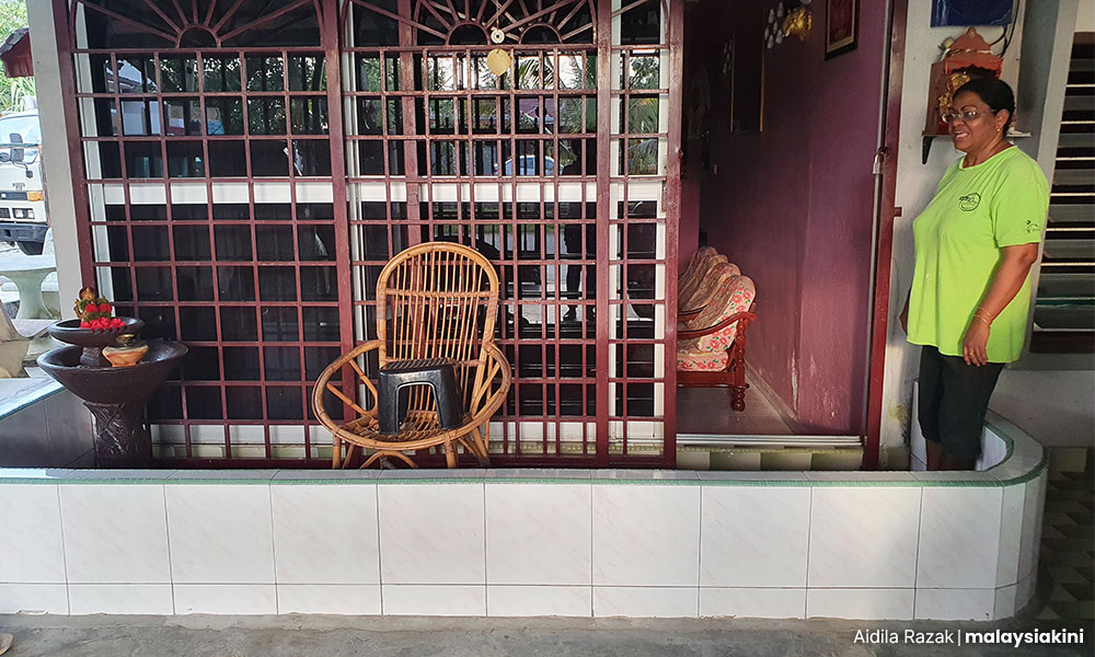 Photo of Shamala Devi has spent all her extra money on flood mitigation for her home in Taman Bunga Ros, Klang by Aidila Razak.