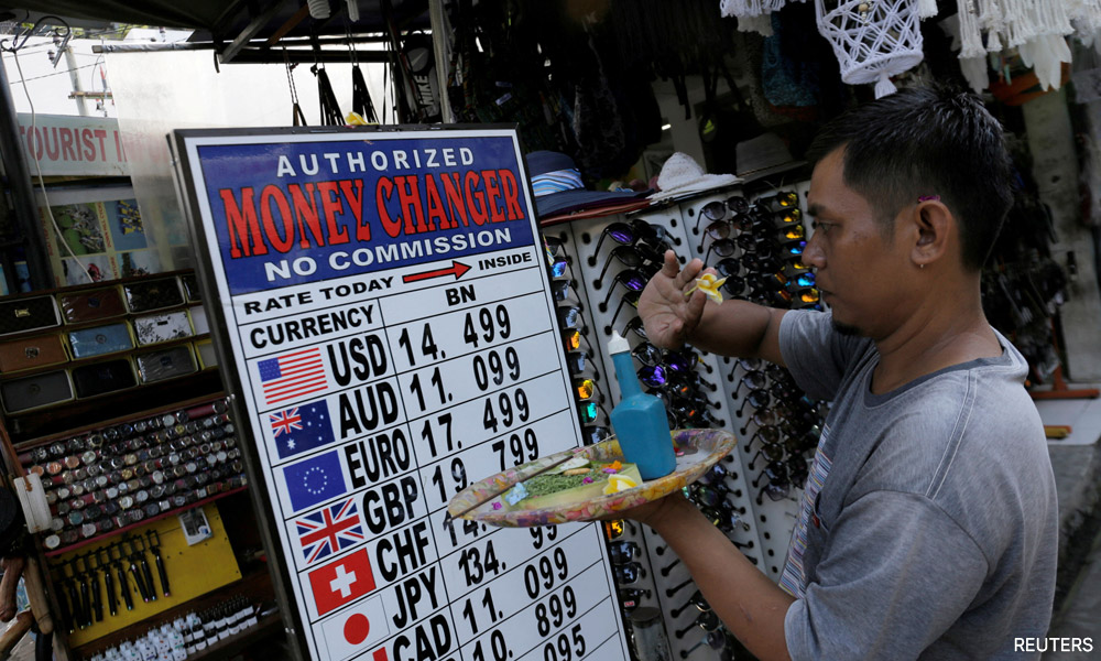 Analysis-Asia's southern flank shines in fight vs surging dollar