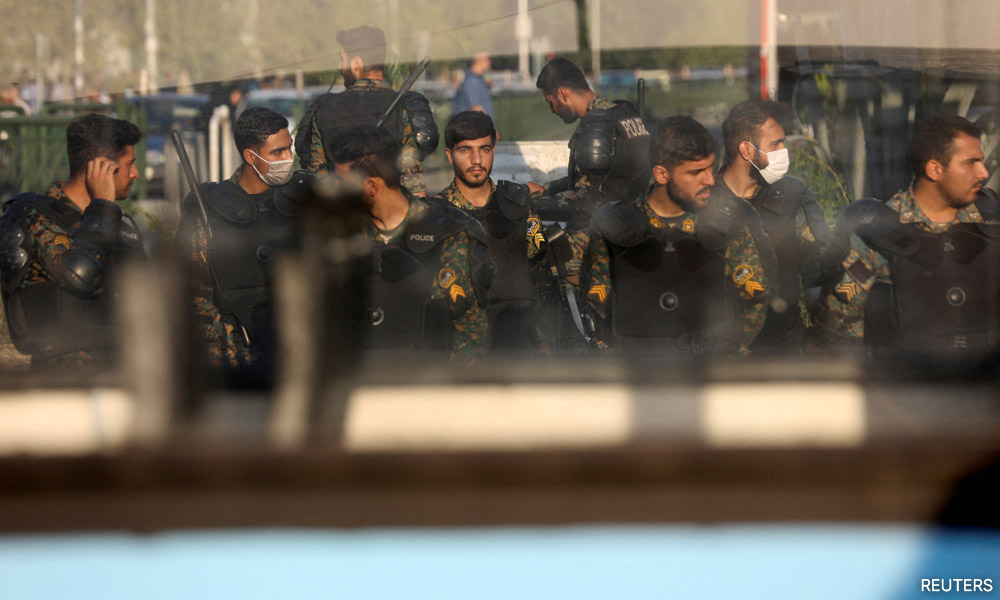 Women students tell Iran's president to 'get lost' as unrest rages