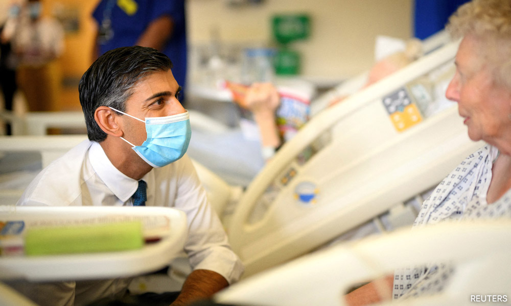 England rushes to discharge hospital patients to ease bed-blocking crisis
