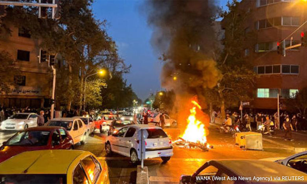 Iran hangs two men accused of killing security official during protests