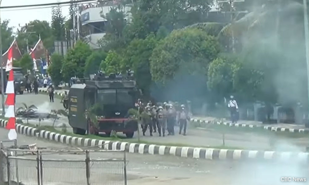 Indonesia tightens security in Papua after nine killed in riot