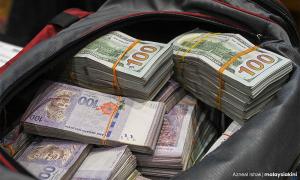 Tan Sri among 2 arrested over RM300m investment fraud