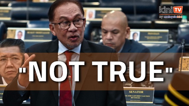Anwar denies Guan Eng revoked Albukhary's tax-exempt status