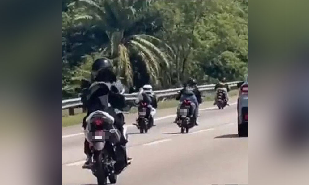 Women performing 'Superman' stunt while riding nabbed