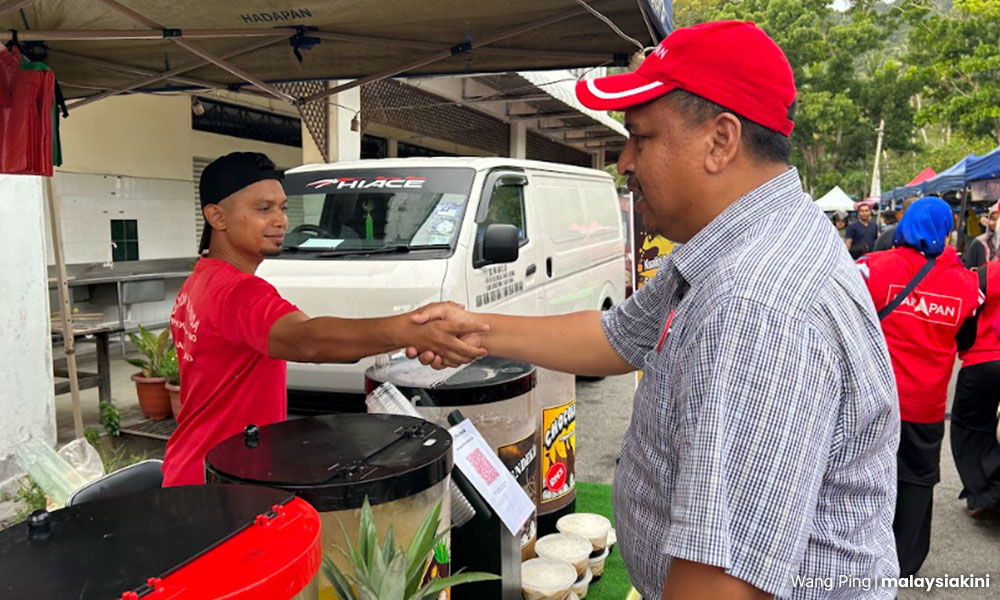 In Bayan Lepas, locals view Azrul as more than Lau's opponent