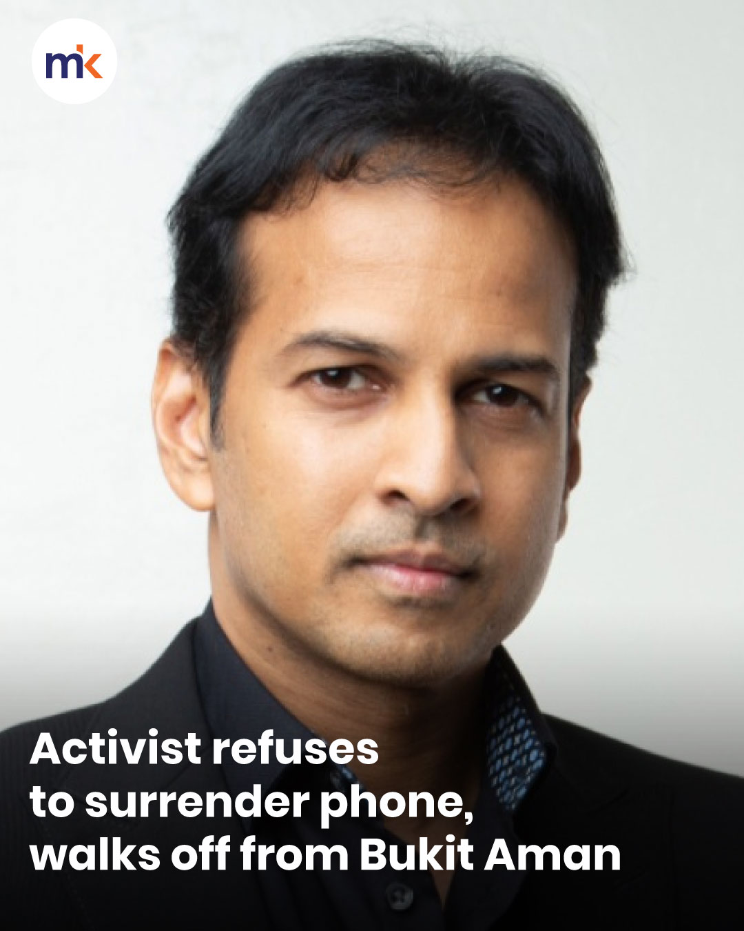 Activist refuses to surrender phone, walks off from Bukit Aman