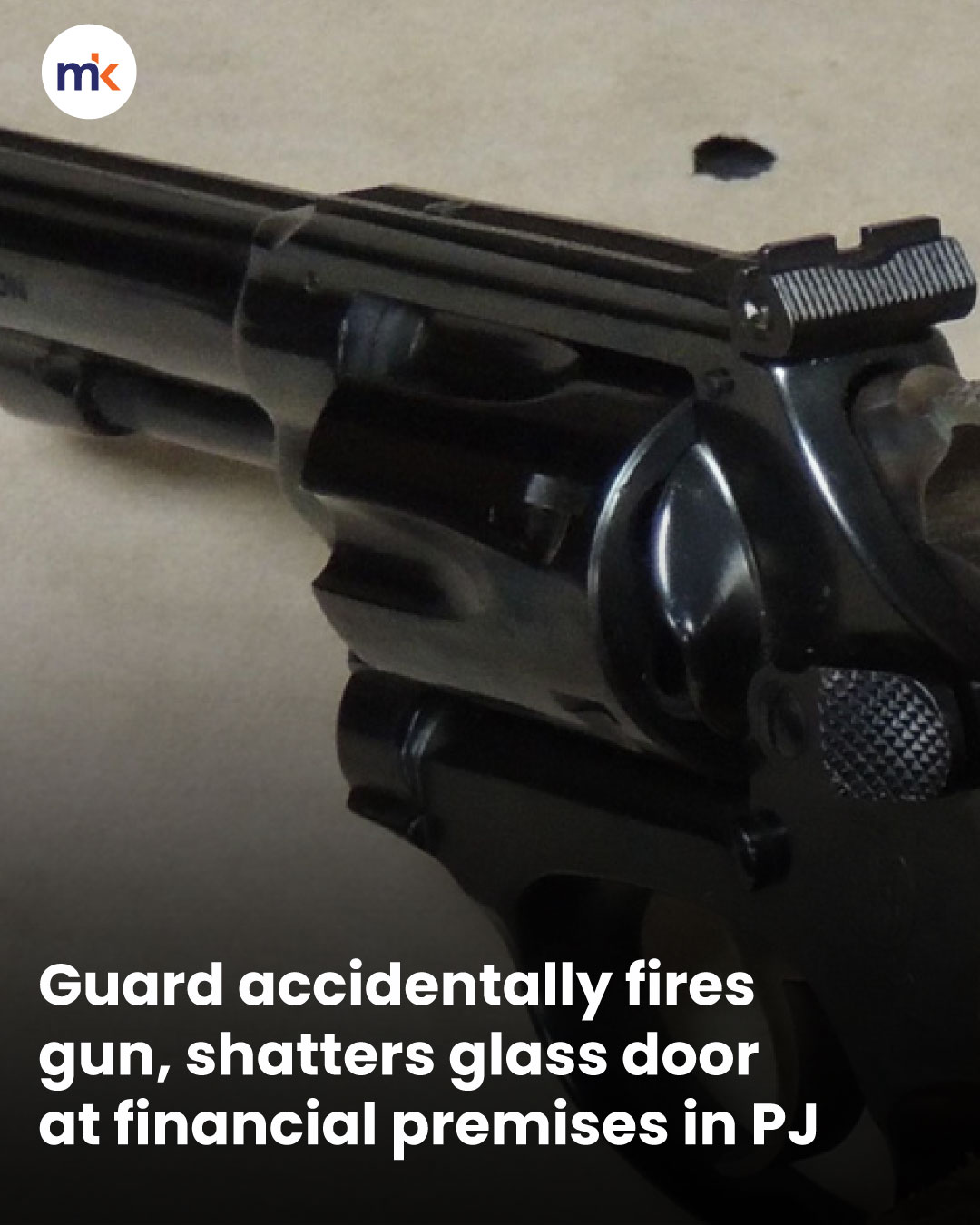 Guard accidentally fires gun, shatters glass door at financial premises in PJ