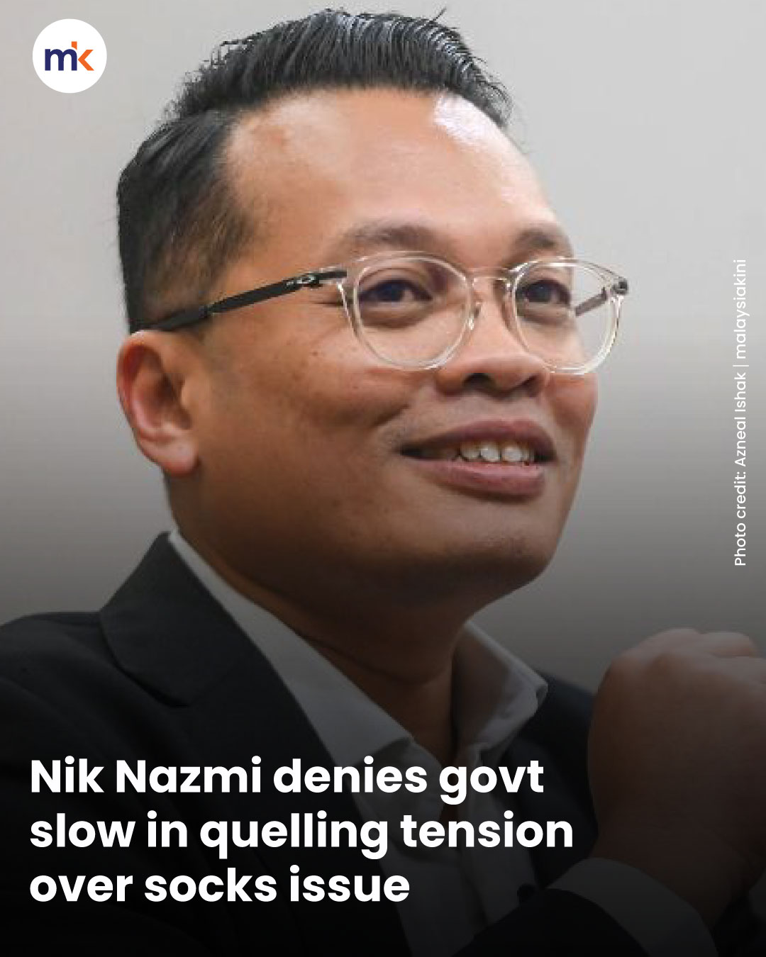 Nik Nazmi denies govt slow in quelling tension over socks issue