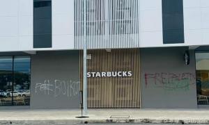 Starbucks outlet in Sabah vandalised with 'boikot, Free Palestine' graffiti