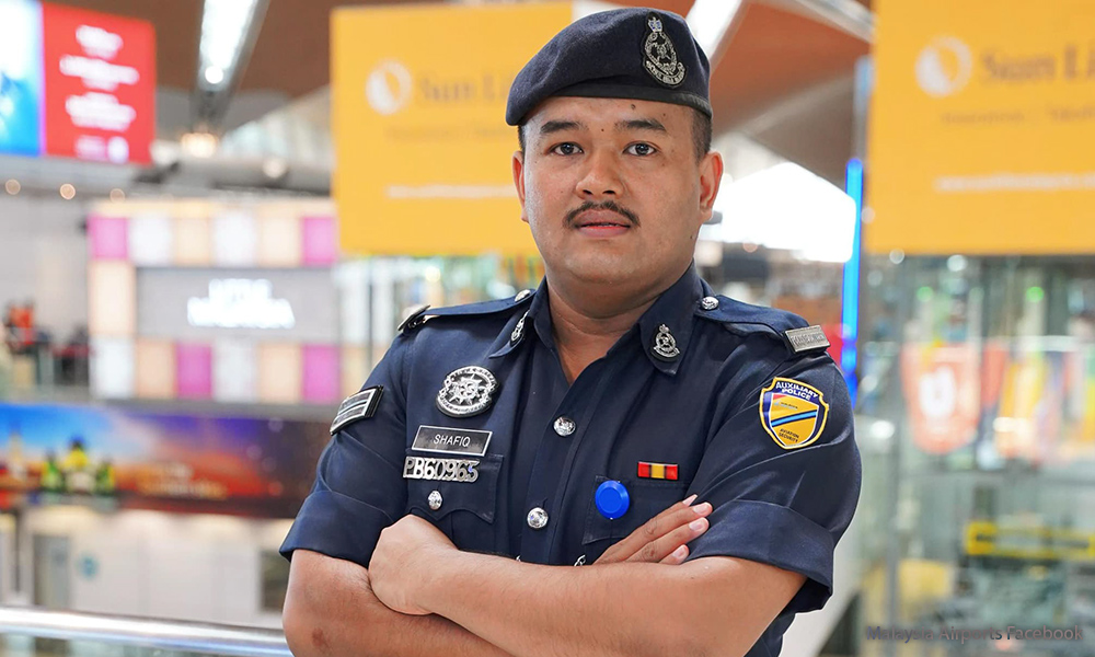 马来西亚机场向安保人员致敬