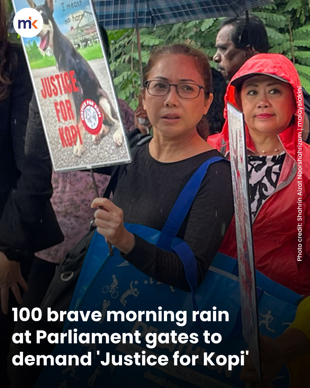 100 brave morning rain at Parliament gates to demand 'Justice for Kopi'