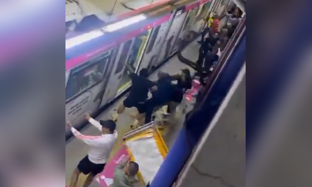 Police arrest two over fight between football fans at LRT station
