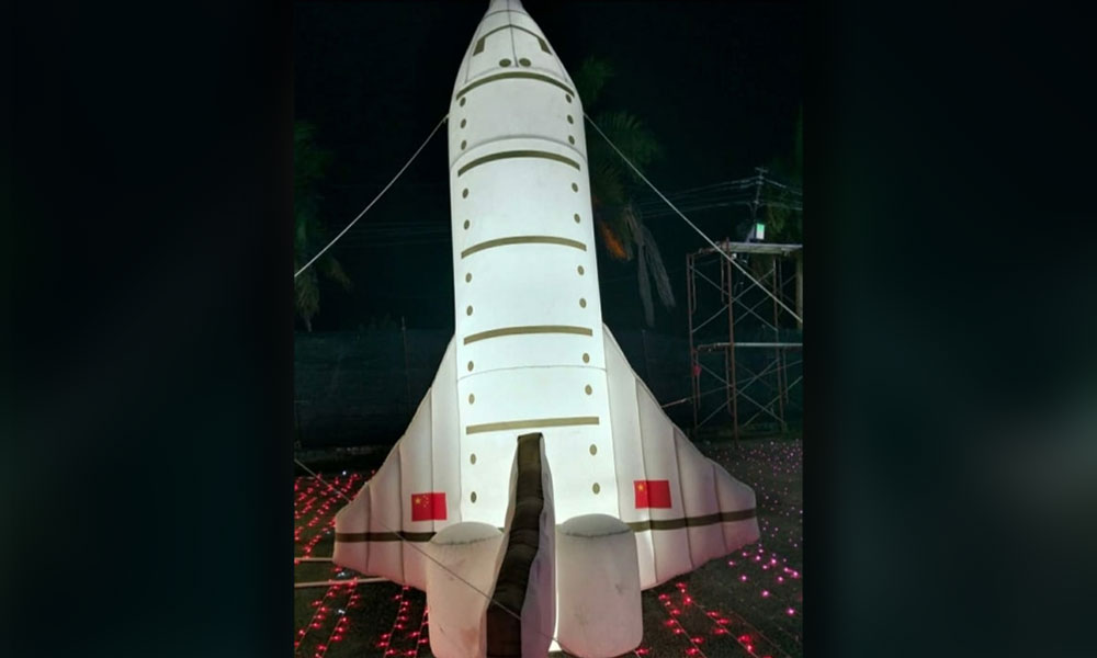 Carnival halted over replica spacecraft with Chinese flag
