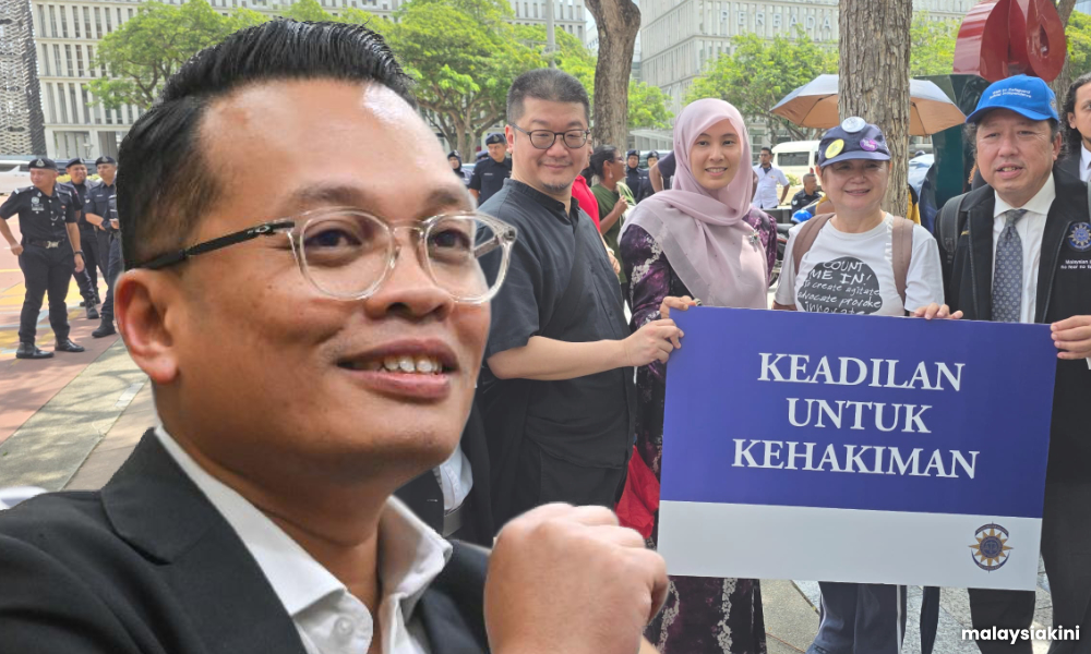 After Izzah's rally march, Nik Nazmi urges PKR divisions to sign petition