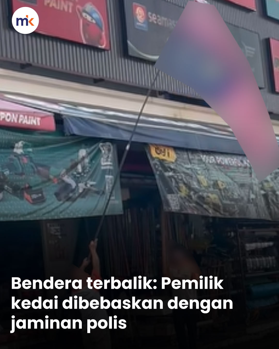 Bendera terbalik: Pemilik kedai dibebaskan dengan jaminan polis