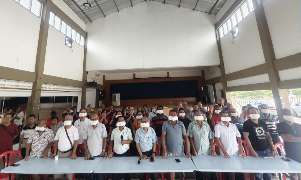 N Sembilan DAP veterans wear 'pad masks' to protest 'outsider' senator