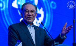 Anwar tiba di S'pura untuk pemukiman pemimpin Malaysia-S'pura ke-12