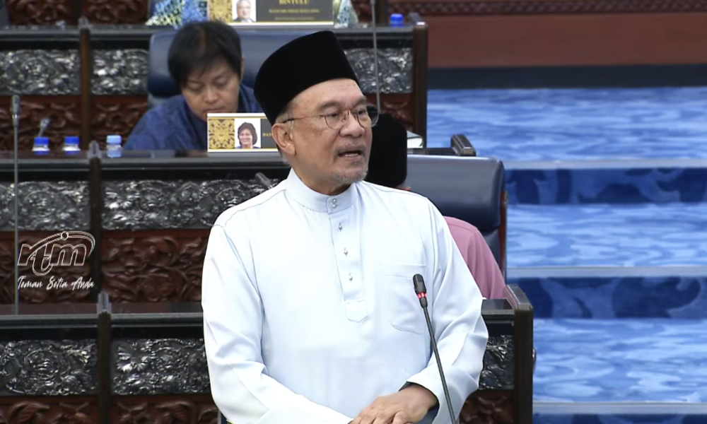 Anwar unveils national budget with pay hikes and aid measures
